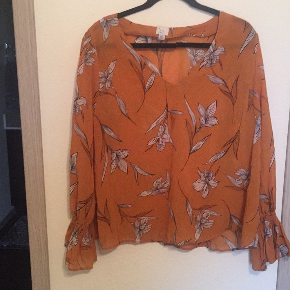 Orange floral blouse